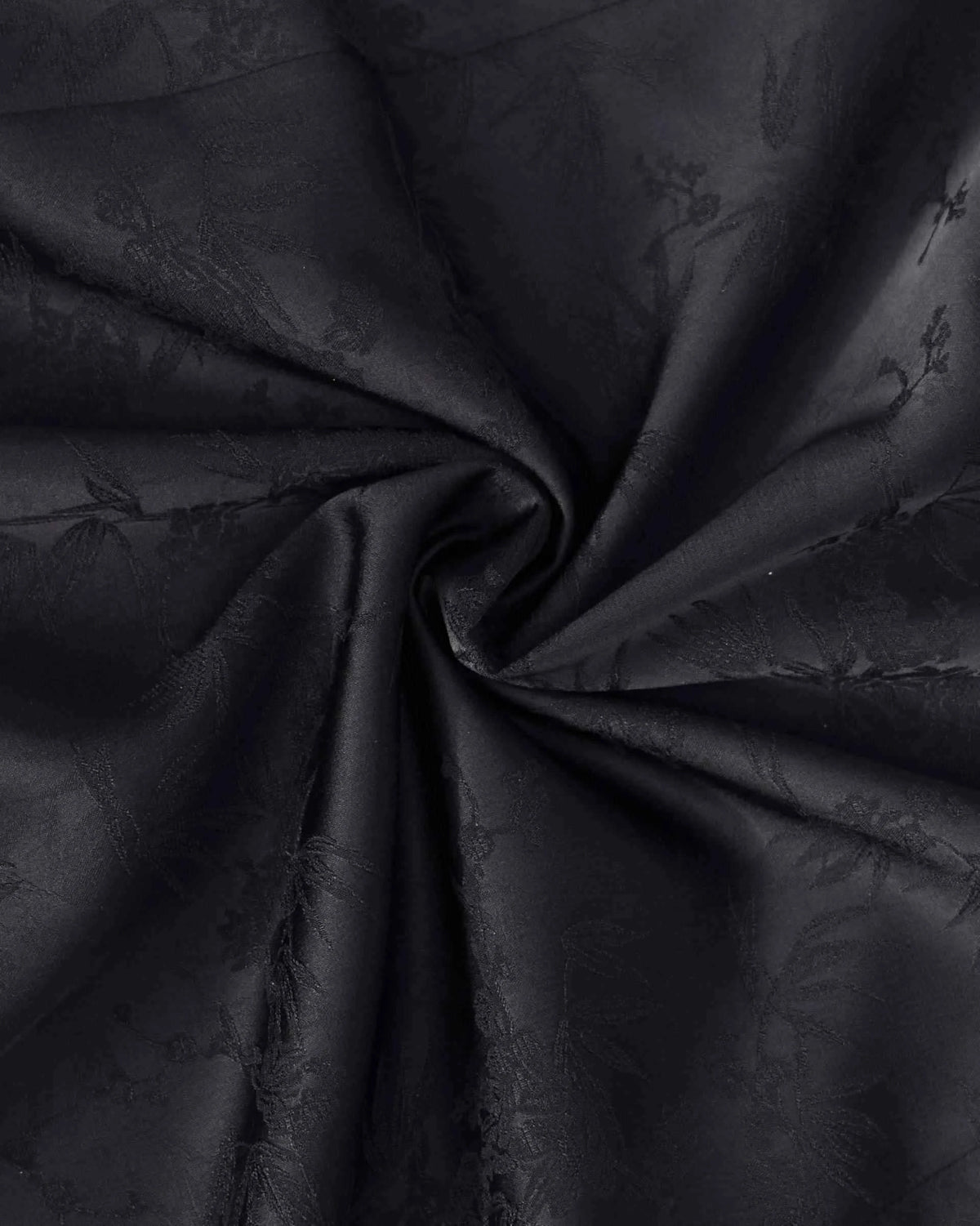 The close view reveals subtle tonal texture as the fabric gathers into folds.