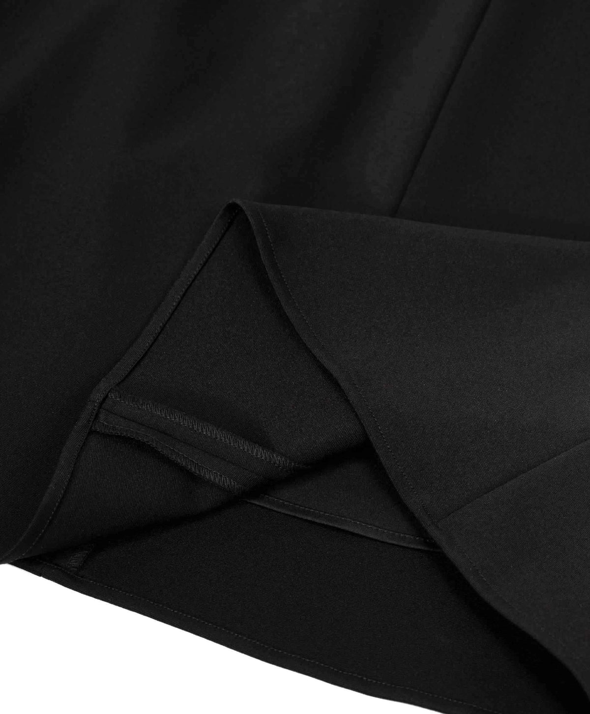 The close view shows overlapping folds and a neatly finished lower edge in black.