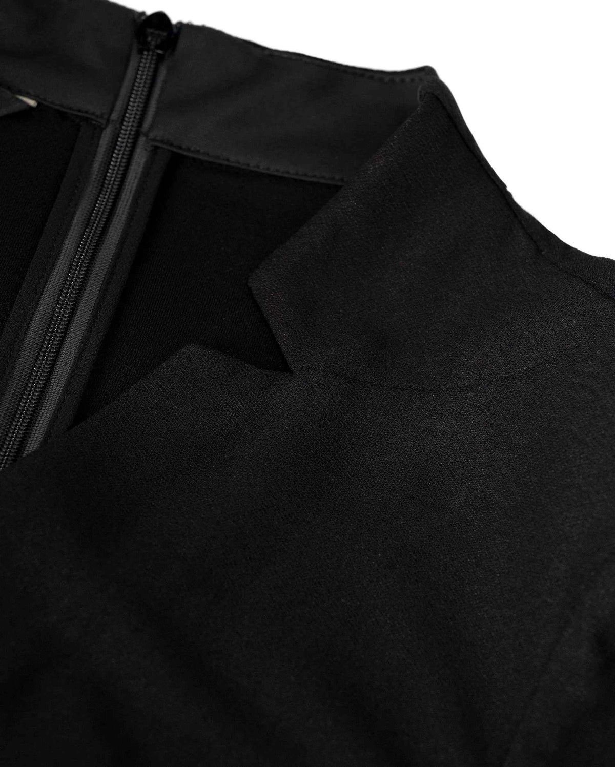 The shaped neckline forms a clear opening beside the back fastening and smooth upper fabric.