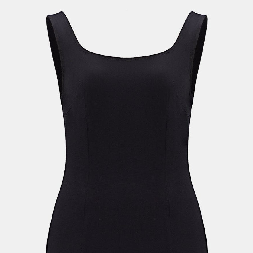The wide shoulder sections meet a gently curved neckline above a closely shaped body.